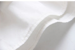 Bluza eleganta Geraldine, volane, alb cu roz pudra